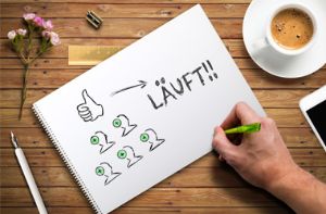 Bild mit Block und Stift.